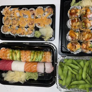 From top to bottom, left to right: Spicy Crab Roll, Spicy Tuna Roll, Shrimp Lover Roll, rainbow roll (nigiri), Da Bomb Roll, Edamame