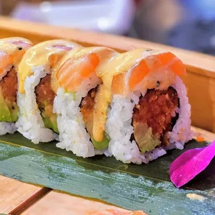 Spicy Tuna roll topped with Salmon