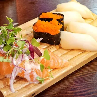 Salmon Sushi with Salad, masago, white tuna