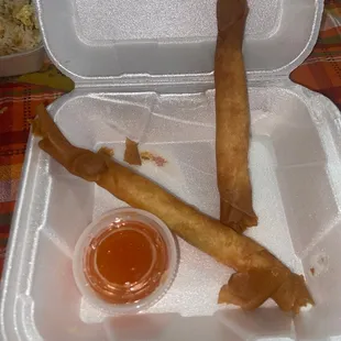 Crispy shrimp rolls, arrived cold, yet were so hot when plated it burned through the to go container