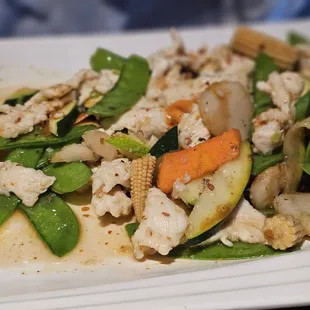 chicken and snow peas. My wife asked for a little heat. They added the perfect amount to this deklicious dinner