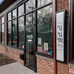 the outside of a building with large windows