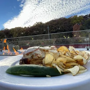 Tuna-melt at sunset at the outdoor fireplace.