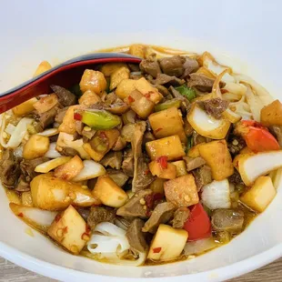 a bowl of stir fried vegetables