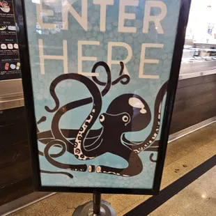 a sign with an octopus on it