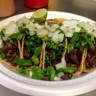 a plate of tacos on a table