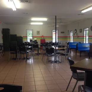 a large room with tables and chairs
