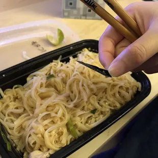 N1. Pad Thai with a piece of hard plastic inside