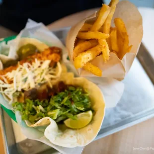 Combination meal - two tacos and sesame fries