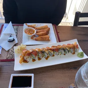 One night sushi bar roll and blanketed shrimps.