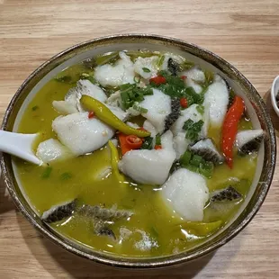 Live fish with pickled vegetables