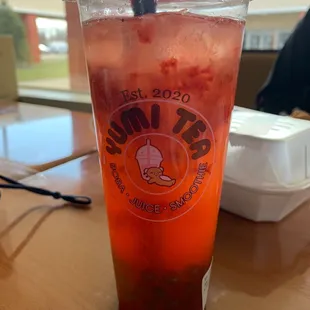 Strawberry lemonade with kiwi popping boba