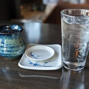 Soy, saucers, and water with ice