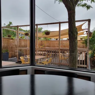 Looking at the patio from the window table inside.