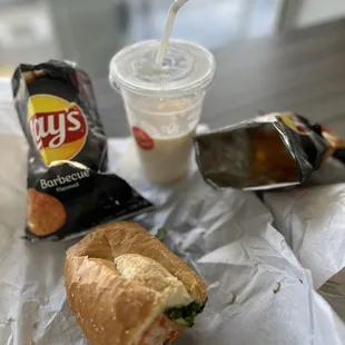 a bag of chips and a drink