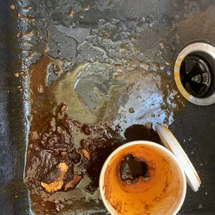 Holes were melted into the bottom of their to go containers.