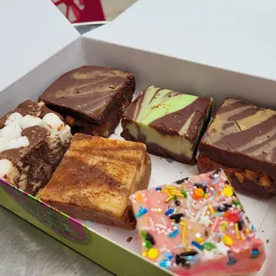 Got upsold on fudge. Was gonna buy 3, but then they said if I got 1 more I&apos;d get 2 free!