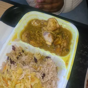 Chicken curry, rice and peas, cabbage