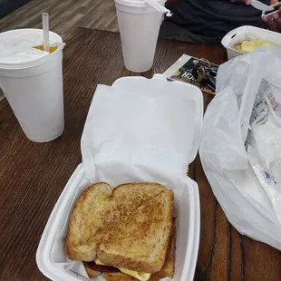 a sandwich in a styrofoam container