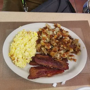 Yum yum 5 cheese eggs beef bacon and home fries  with onions well done get u rite 4 the day