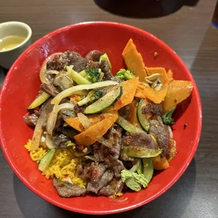 Bowl with Dragon Sauce. Fresh, hot and delicious. California rolls were awesome also! Excellent.