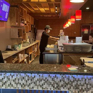 Behind the counter prepping