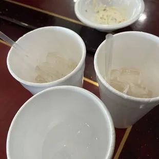 three cups of soup and a spoon