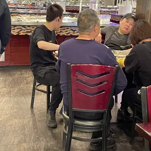 Wait staff eating and not giving service!