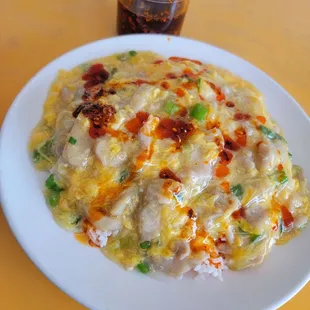 Meena Special, chicken with scrambled eggs over rice!