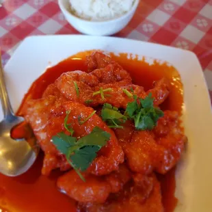 Sweet and sour pork chop with side of rice