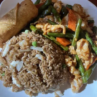 a plate of food with rice and vegetables