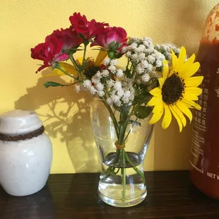 a vase of flowers on a table