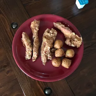 Chicken strips and hush puppies