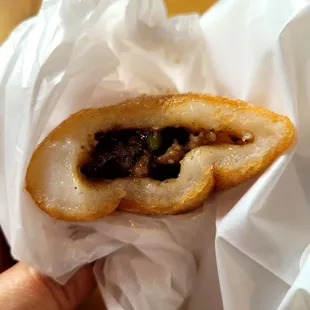 Ham sui gok. Deep fried mochi meat dumpling $1.25 each.