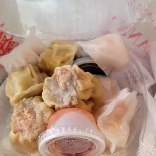 1 order each of siu mai and har gow. $5 for each set of 4 dumplings.