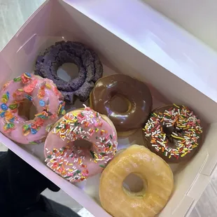 a variety of donuts in a box