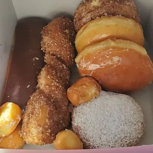 a variety of donuts in a box