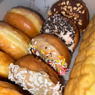 a variety of donuts in a box