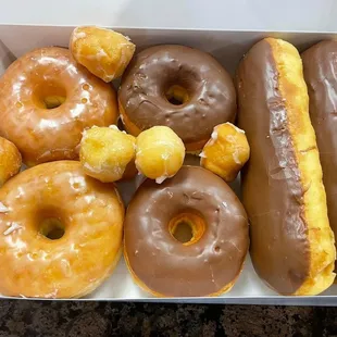a variety of donuts in a box