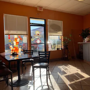 a table and chairs in a restaurant