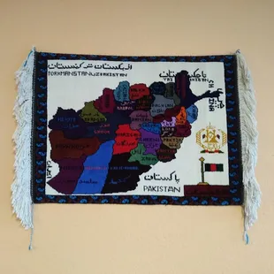 Woven map decorating wall