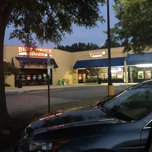 a car parked in front of a restaurant