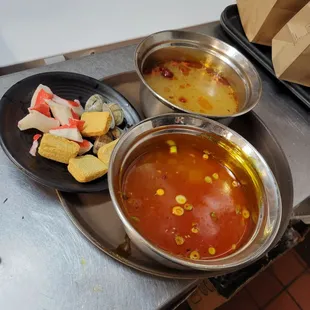 a bowl of soup and a plate of cornbreads