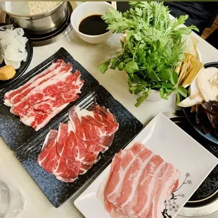 a variety of meats on a table