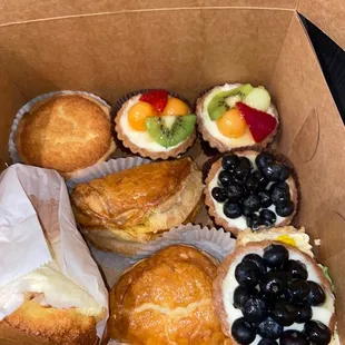 a variety of pastries in a box