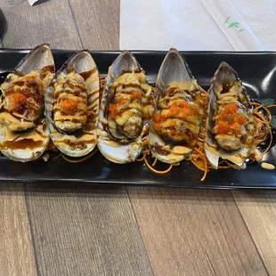 a plate of grilled clams