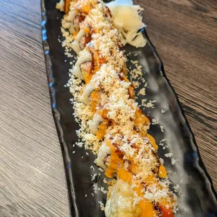 a plate of sushi on a table