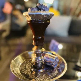 a chocolate drink on a silver tray