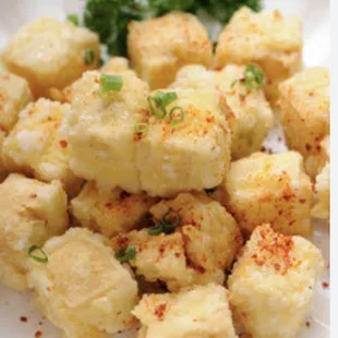 a plate of fried tofu