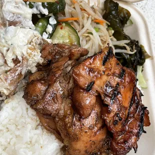 chicken, rice, and vegetables in a styrofoam container